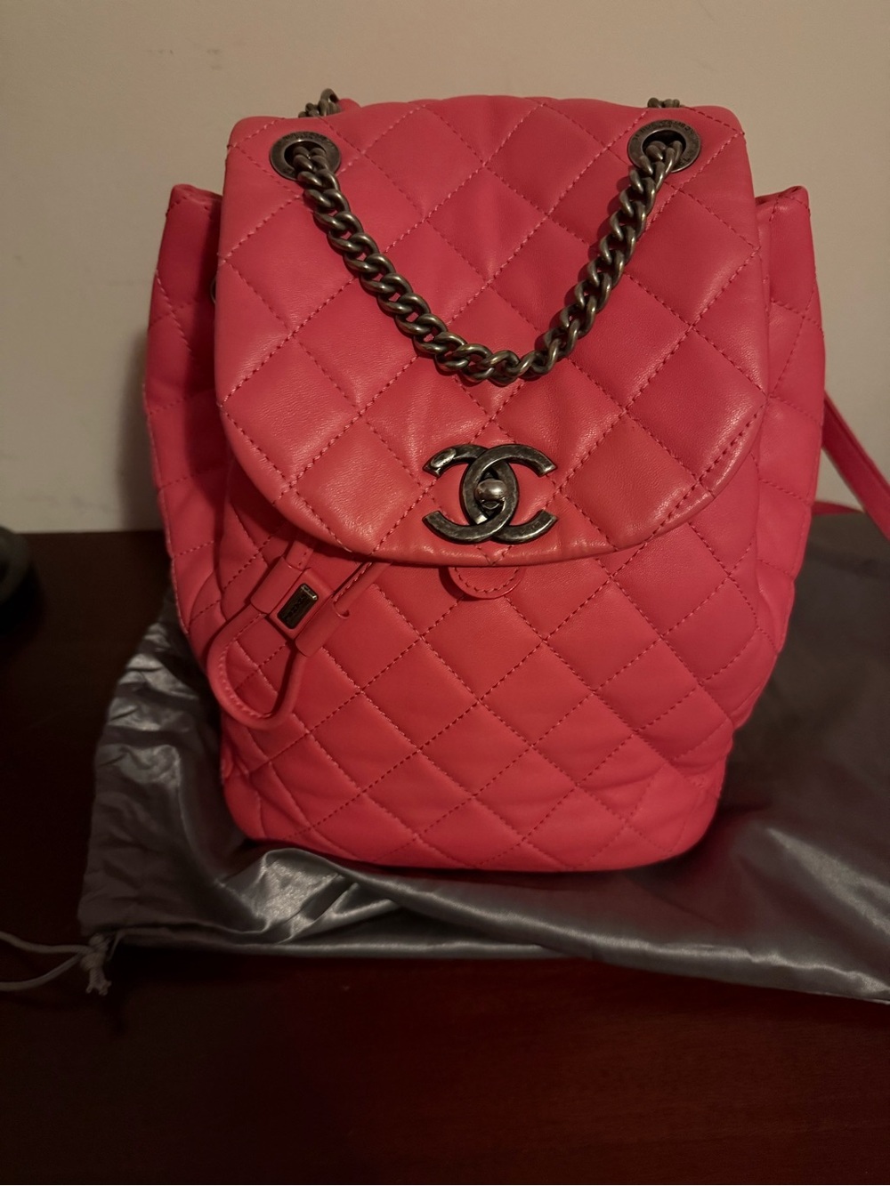 CHANEL Pink Quilted Leather Backpack with Chain Detail